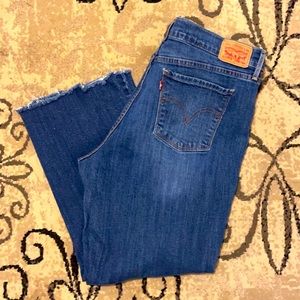 Levi cut off blue jeans. Size 16